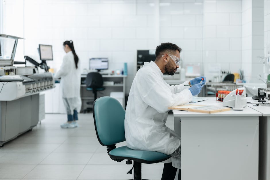 A diverse group of researchers working in a modern laboratory setting