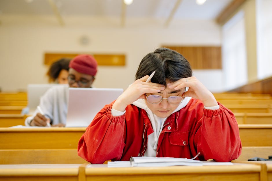 Image of a person studying with books and notes, preparing for the GATE exam