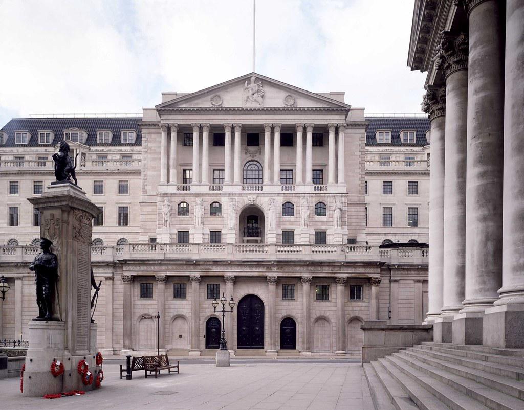 The exterior of the Bank of England's iconic building, with its neoclassical architecture and imposing columns.