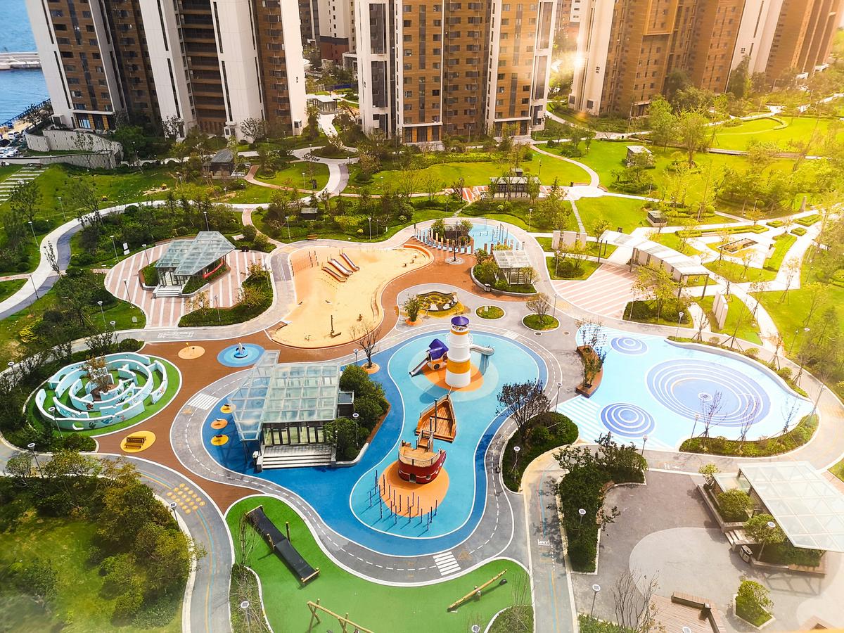 Aerial view of Lake Forest Park Elementary School surrounded by lush greenery and playgrounds