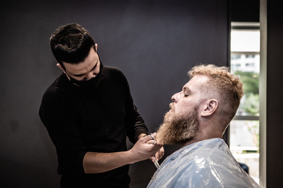 Image of a person trimming their mustache with precision.