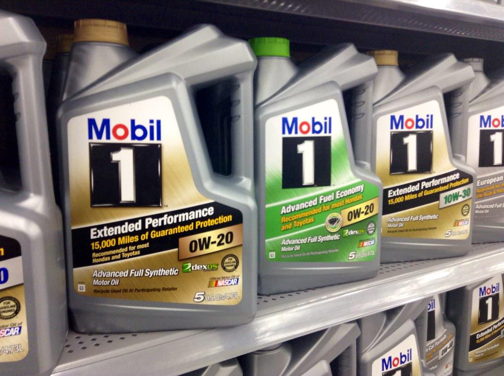 Different types of motor oils, including conventional and synthetic varieties, displayed in their respective bottles or containers.