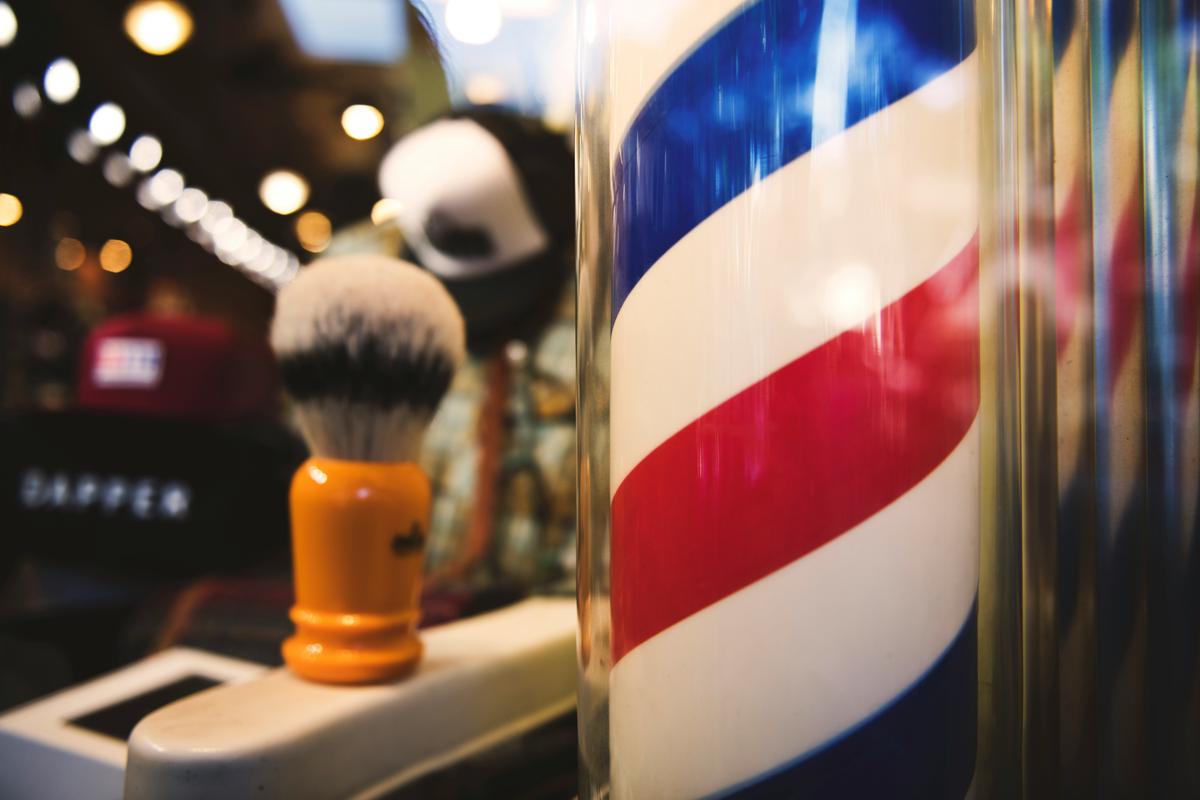 An image depicting various traditional wet shaving tools and products