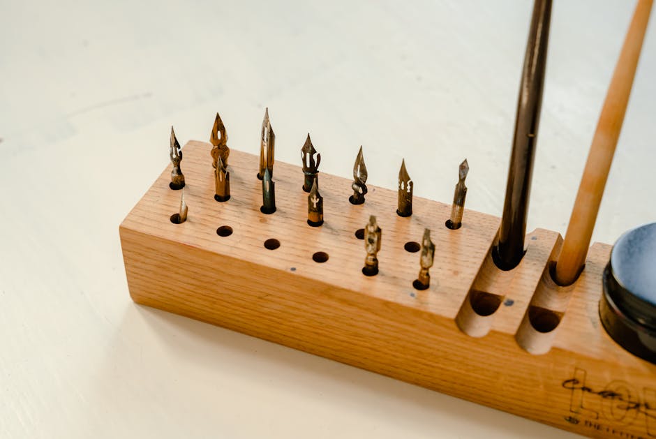 Various traditional wet shaving tools and products displayed on a wooden table