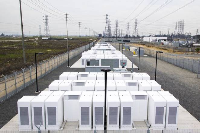 Illustration of a large utility-scale battery energy storage facility connected to the power grid, with no text or labels